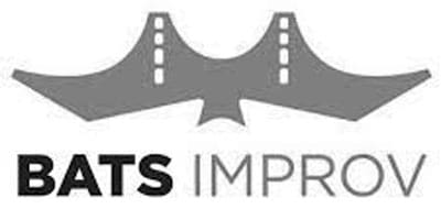 A logo featuring a bat shape combined with a bridge design above the words BATS IMPROV in bold, uppercase letters, with BATS in black and IMPROV in gray.