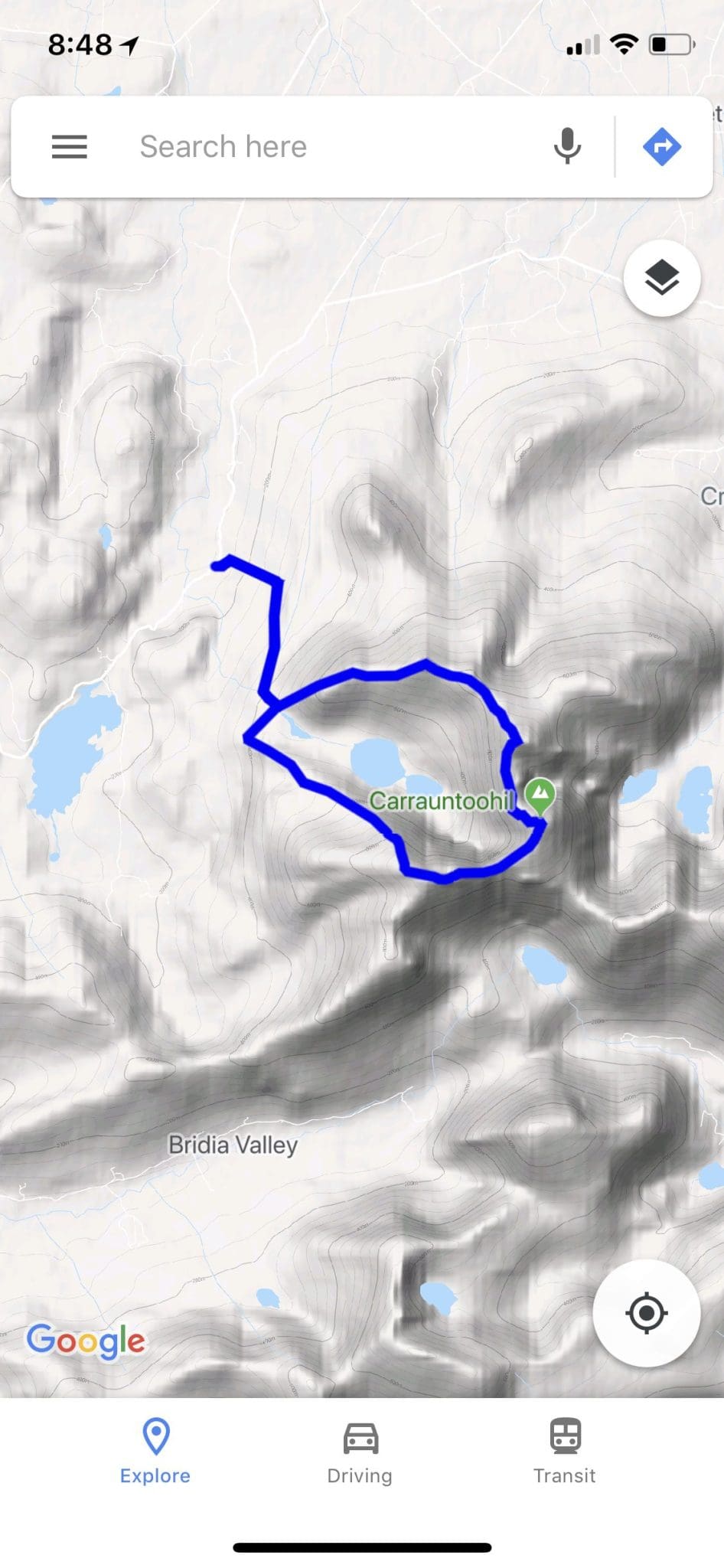Map showing the hiking trail up Carrauntoohil, Ireland's highest peak, with lakes and valleys.
